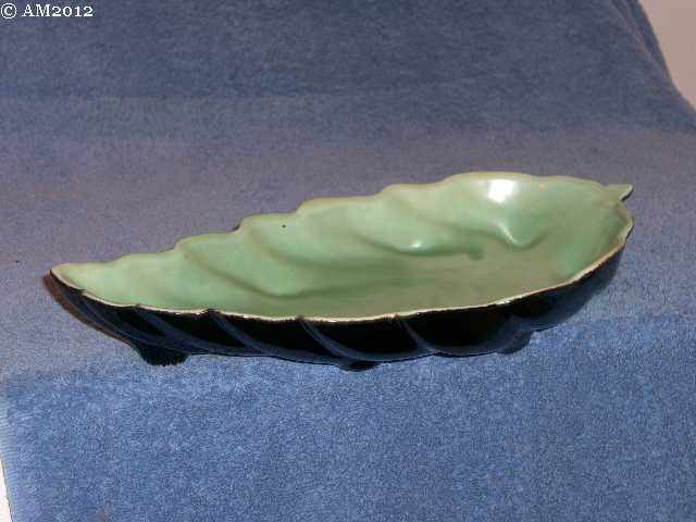 Medium leaf bowl glazed black with jade green interior